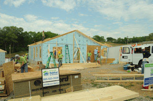 Sigma Nu volunteering with Habitat for Humanity