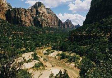 Virgin River flowing between the mountains of Zion National Park