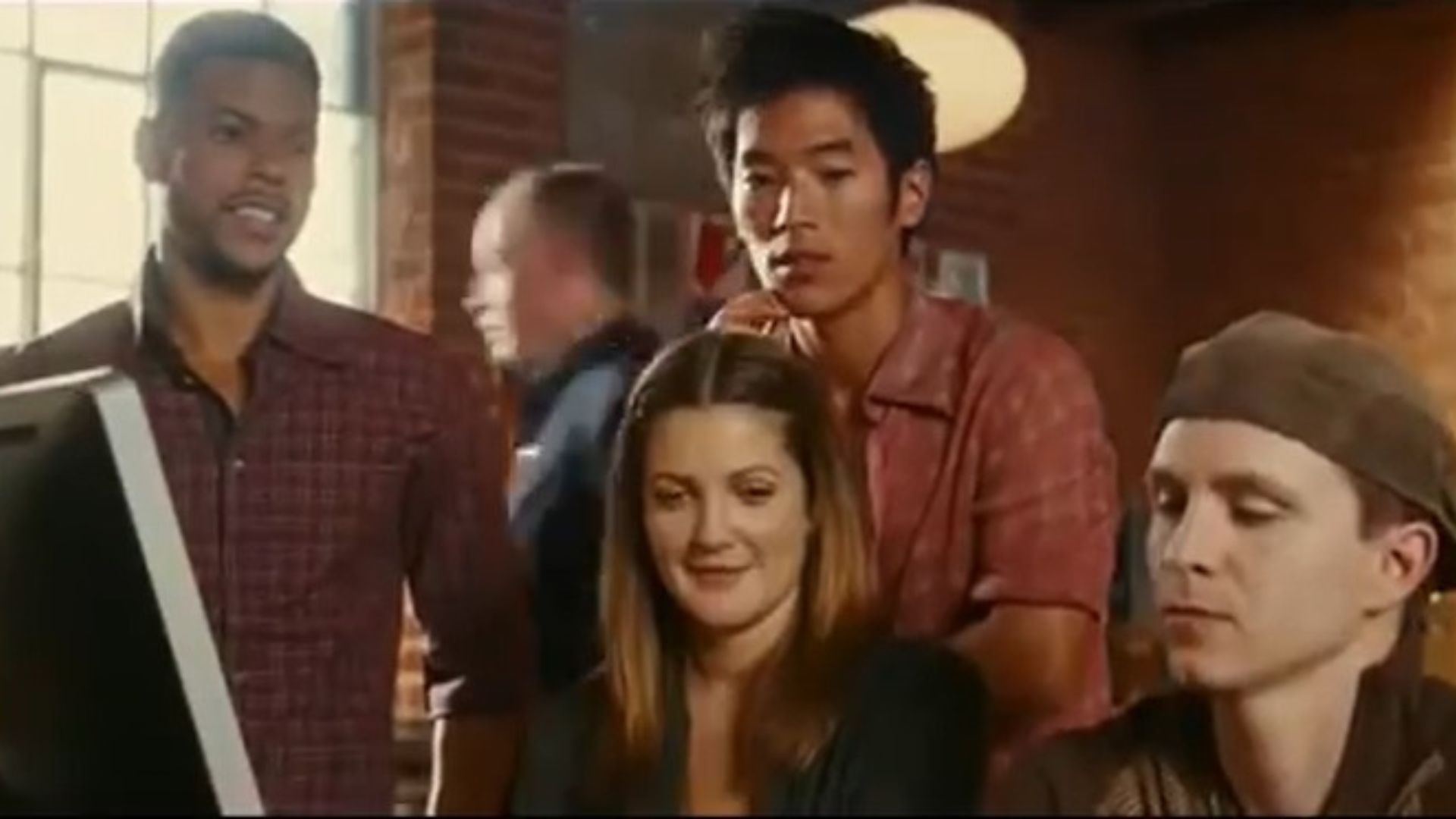 Drew Barrymore and cast of coworkers in He's Just Not That Into You.